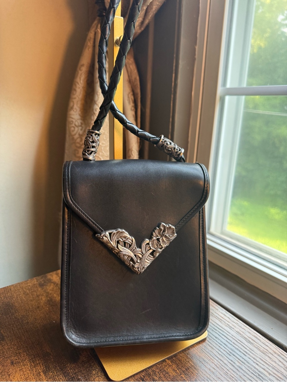 Brighton Black Leather Crossbody with Ornate Silver Floral Accent